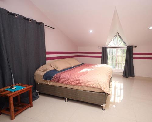 Ένα ή περισσότερα κρεβάτια σε δωμάτιο στο Marissa Guest House