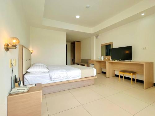 Postel nebo postele na pokoji v ubytování 라메디 리조트 보홀 Ramede Resort Bohl