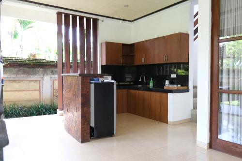 Kuchyň nebo kuchyňský kout v ubytování Budhi Ayu Villas and Cottages Ubud by Mahaputra-CHSE Certified