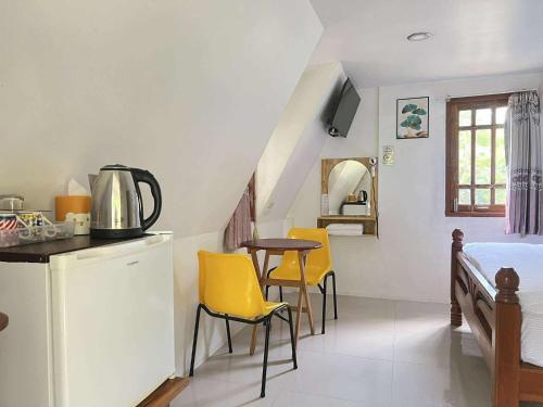 Kuchyň nebo kuchyňský kout v ubytování Pijittra Resort