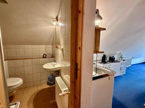 Ένα μπάνιο στο Ferienanlage "Uns Wiek Hus" Ferienwohnung 7