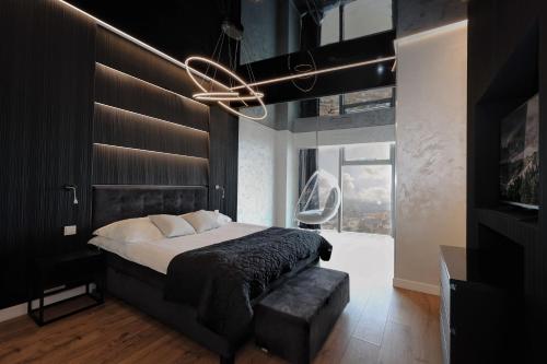 Кровать или кровати в номере In The Sky - Apartamenty w Sky Tower