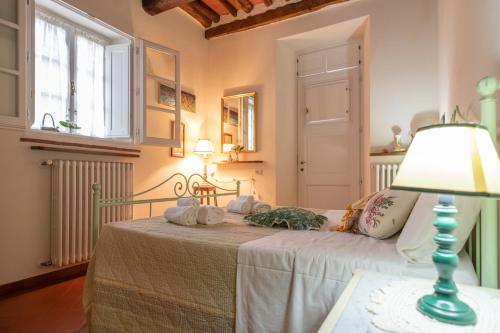 Una cama o camas en una habitación de In Versilia