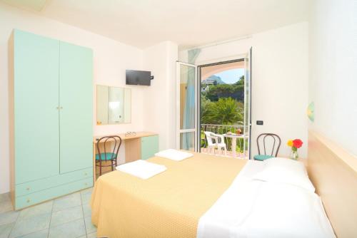 Ένα ή περισσότερα κρεβάτια σε δωμάτιο στο Hotel Park Victoria