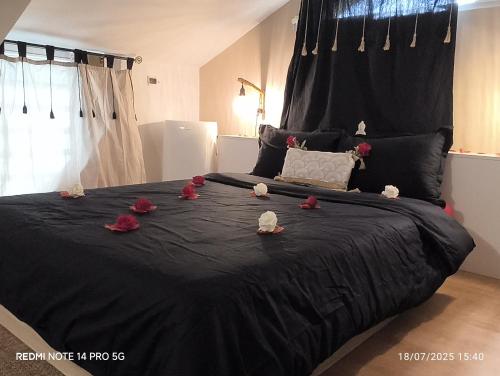 a bed with a bunch of stuffed animals on it at Damaniel * Ze Détente * Jacuzzi* in Le Tampon
