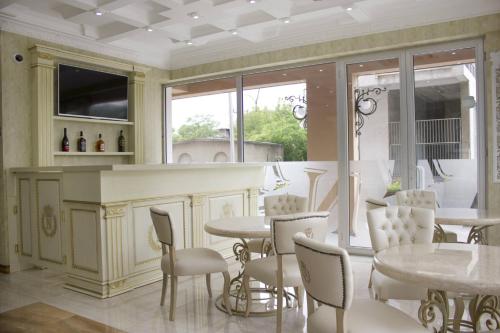 Μια τηλεόραση ή/και κέντρο ψυχαγωγίας στο Neapol Boutique Hotel