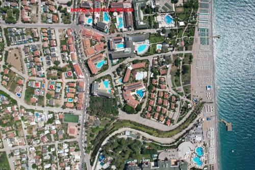 a map of a city next to the water at Camyuva Beach Hotel in Kemer
