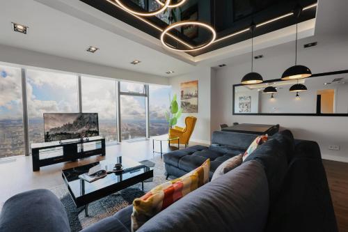 Гостиная зона в In The Sky - Apartamenty w Sky Tower