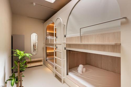 Postel nebo postele na pokoji v ubytování Literal Hostel