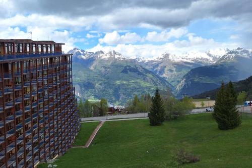 a view of a mountain range from a building at Beautiful studio with balcony - nice view in Bourg-Saint-Maurice
