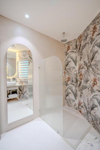 a bathroom with a mirror and a sink at Girisadan Boutique Stay in Jaipur