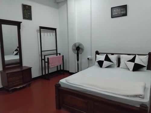 Кровать или кровати в номере Ella Sanara Holiday Homes