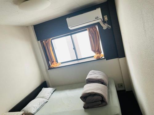 Postel nebo postele na pokoji v ubytování Lucky Hostel