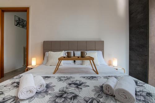Postel nebo postele na pokoji v ubytování Easylife - Moderno e Luminoso nel Cuore di Jesi
