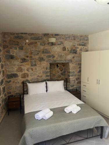 Stone Olympi Lodges - Chios Cozy Hideawaysにあるベッド