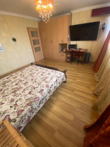 Μια τηλεόραση ή/και κέντρο ψυχαγωγίας στο Затишна квартира подобово