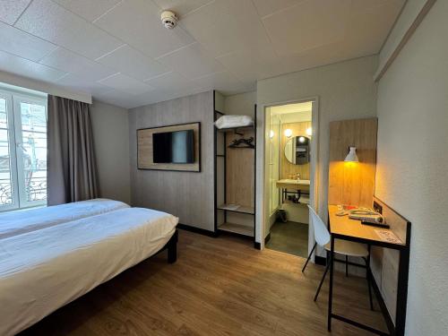 Postel nebo postele na pokoji v ubytování ibis Limoges Centre