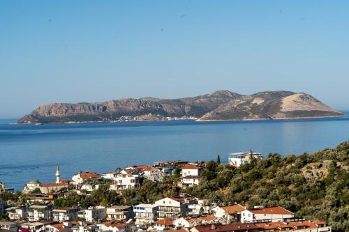 a town on the shore of a large body of water at Brow City Kaş in Kas