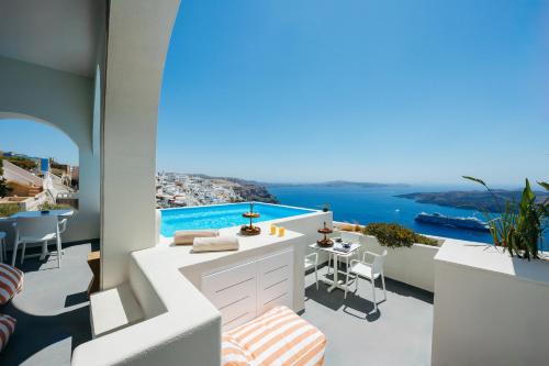 a villa with a view of the ocean at Kastro Suites in Fira