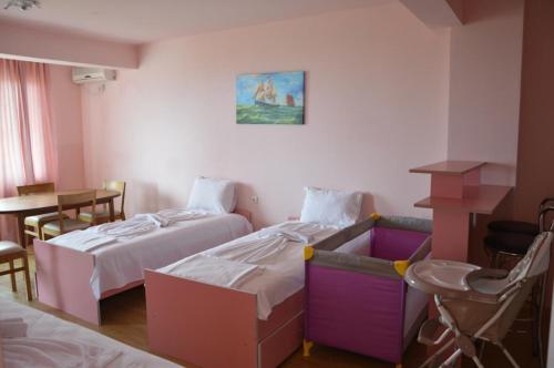 Postel nebo postele na pokoji v ubytování Complex Exotica