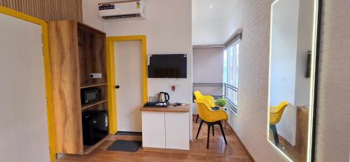 Kuchyň nebo kuchyňský kout v ubytování Stayinn Suites