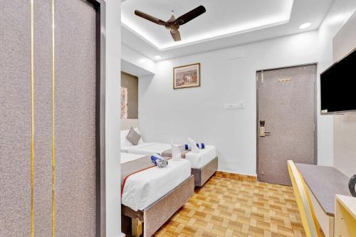 TV a/nebo společenská místnost v ubytování The K11 Hotels - T Nagar