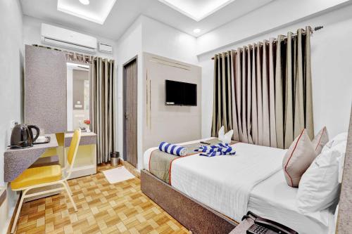 Postel nebo postele na pokoji v ubytování The K11 Hotels - T Nagar