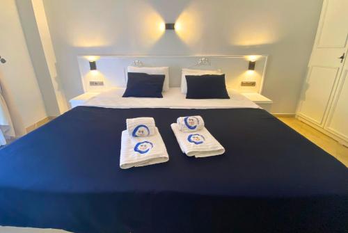 Ένα ή περισσότερα κρεβάτια σε δωμάτιο στο B&B Boutique Hotel