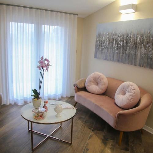 a living room with a couch and a table at B&B Martina in Mirabella Eclano