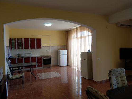 Kuchyň nebo kuchyňský kout v ubytování Apartment Barski