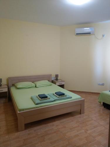 Postel nebo postele na pokoji v ubytování Apartment Barski