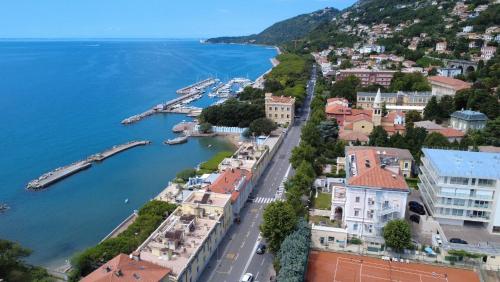 an aerial view of a town next to the water at Greif Hotel & Spa in Trieste