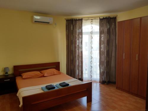 Postel nebo postele na pokoji v ubytování Apartment Barski