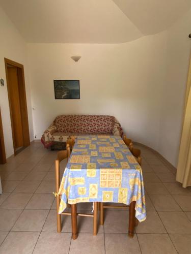 Letto o letti in una camera di Residenza le Saline