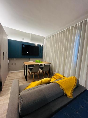 Χώρος καθιστικού στο Loft Aconchegante no Batel 3 Pessoas com Wi-Fi e Estacionamento