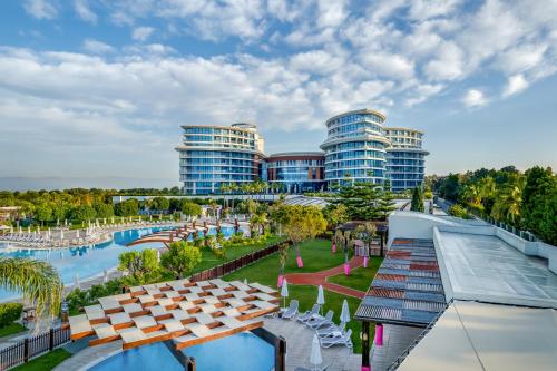 an overhead view of a resort with a pool and buildings at Baia Lara Hotel in Lara