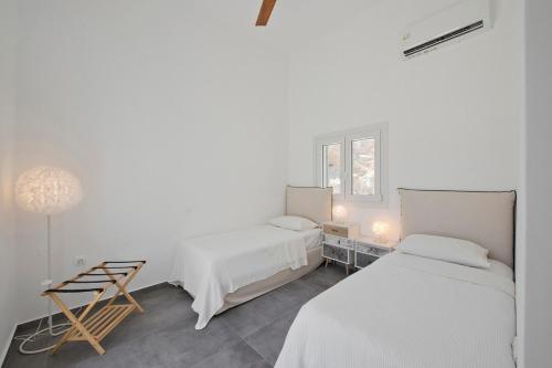 Letto o letti in una camera di Memos Luxury Living at Kithnos