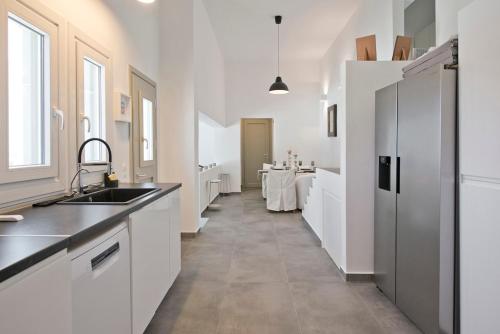 Cucina o angolo cottura di Memos Luxury Living at Kithnos