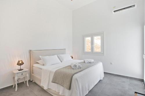 Letto o letti in una camera di Memos Luxury Living at Kithnos