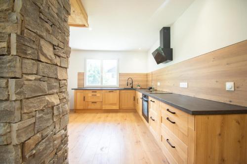 Dapur atau dapur kecil di Le Paisible I 12 personnes & Vue sur l'Alpe D'Huez