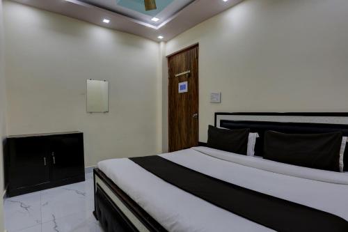 Katil atau katil-katil dalam bilik di Super Hotel O Omex