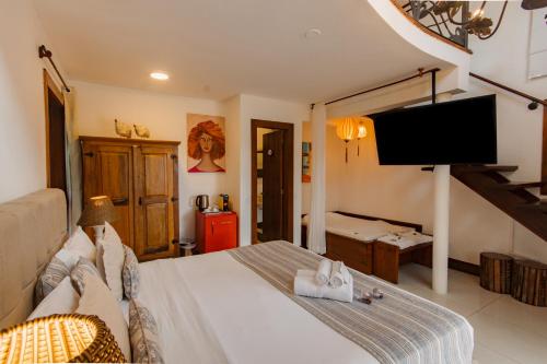 Μια τηλεόραση ή/και κέντρο ψυχαγωγίας στο Le Village Boutique Hotel