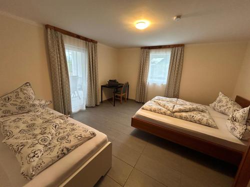 Postel nebo postele na pokoji v ubytování Haus Anna