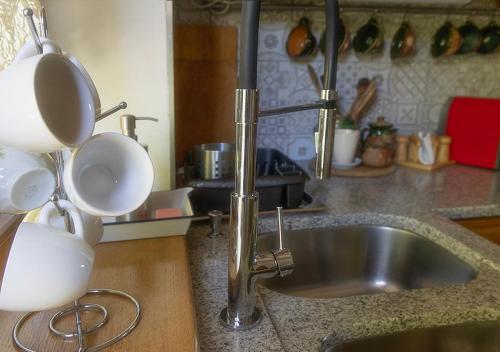 Dapur atau dapur kecil di Míves Vendégház