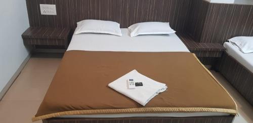 Cama o camas de una habitación en Blueberry Budget Hotel