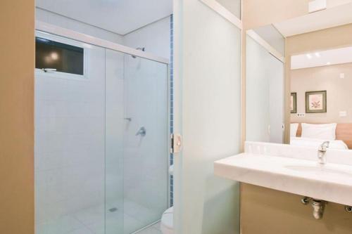 a bathroom with a shower and a sink at Araçatuba Plaza Hotel in Araçatuba