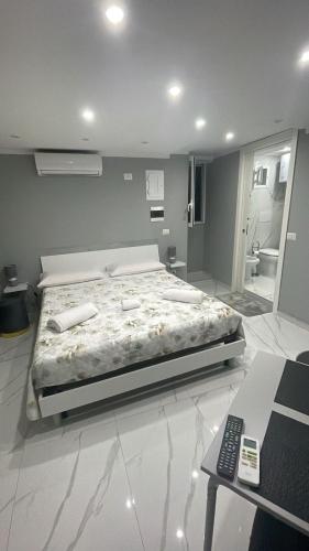 Ένα ή περισσότερα κρεβάτια σε δωμάτιο στο Casa Morimoto