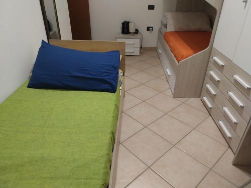 Кровать или кровати в номере B&B Canossa