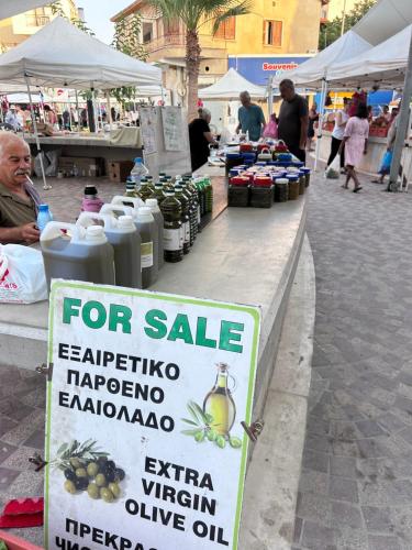 a for sale sign at an outdoor market at Alex Beach Apartment 203 in Larnaka