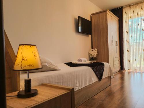 Ένα ή περισσότερα κρεβάτια σε δωμάτιο στο Casa Leu